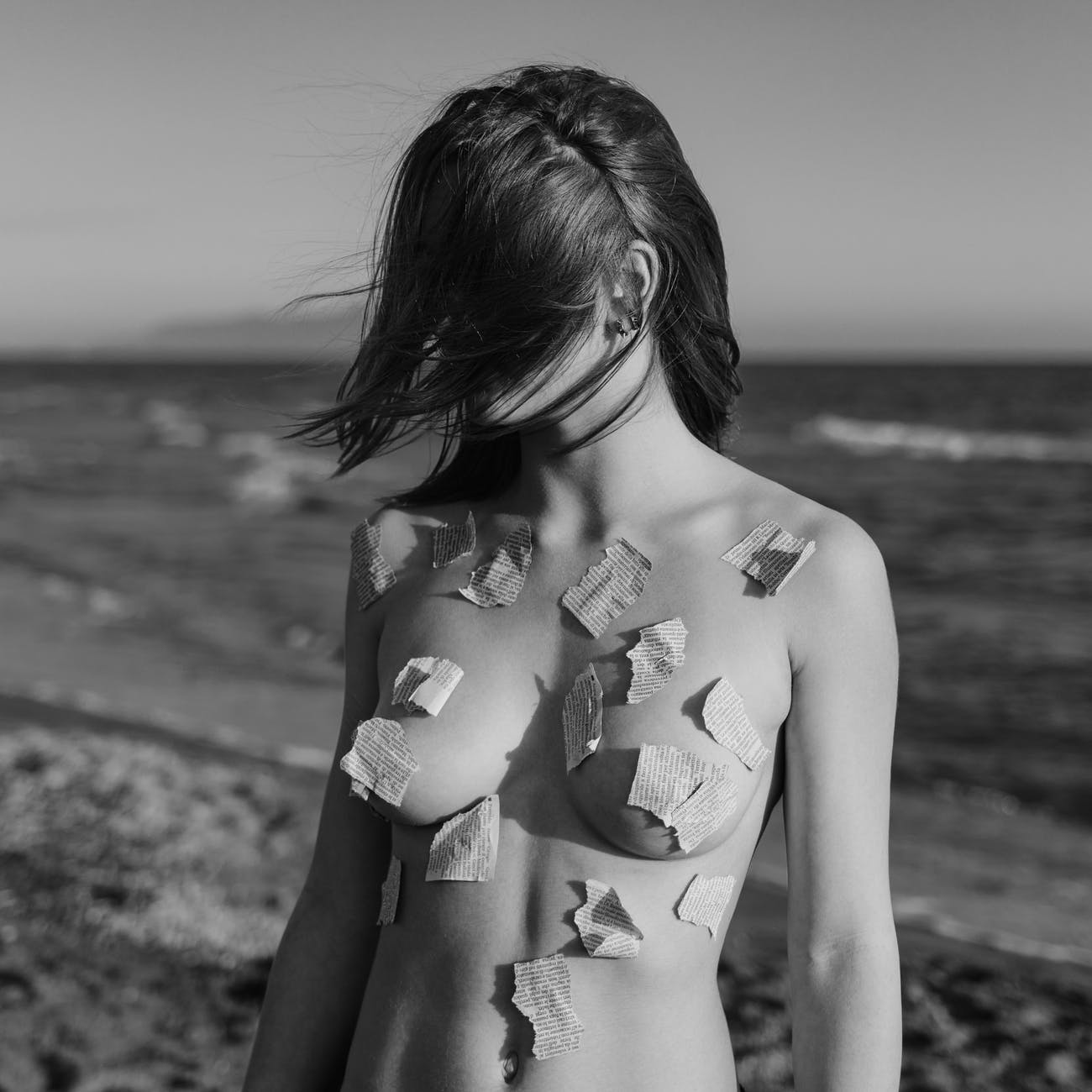 grayscale photography of topless woman